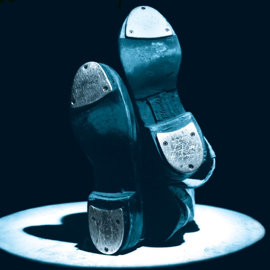 Photo of the base of a pair of tap shoes